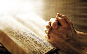 praying-hands-on-bible_web_